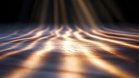 Glowing golden light rays create dynamic wave pattern on dark background with soft focus and depth effect, abstract modern design background.