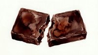 Broken chocolate brownie pieces isolated on white background, ready for food photography, baking content, dessert design projects, and culinary marketing materials.