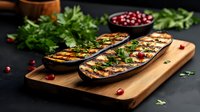 Grilled eggplant slices garnished with fresh herbs and pomegranate seeds on wooden cutting board against dark background, appetizing Mediterranean cuisine.