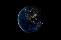 Planet Earth at night showing North America with city lights glowing against dark blue oceans and black space background.