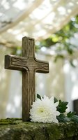 Rustic wooden cross with white chrysanthemum flower on moss-covered surface in peaceful garden setting for memorial, funeral, or spiritual concepts.