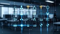 Digital business icons floating in modern office space with holographic interface display showing corporate management and analytics symbols.