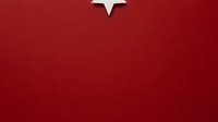 White star ornament on deep red textured background, suitable for holiday greeting cards, festive designs, and seasonal marketing materials.