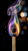 Burning match with colorful rainbow flame and magical smoke swirls against dark background with bokeh lights for creative design projects.