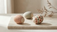 Modern geometric Easter eggs with minimalist patterns on wooden surface, natural lighting, spring home decor, contemporary holiday styling for seasonal design projects.