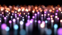 Abstract bokeh lights background with colorful glowing orbs and vertical light streaks creating dreamy atmosphere for festive celebrations and events.