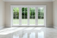 Bright empty room with large white french windows overlooking green garden, sunlight casting shadows on polished marble floor. Modern minimalist interior design.