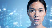 Asian businesswoman with facial recognition technology overlay against futuristic digital city background for AI security and biometric identification systems.