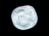 Clear water droplets fill a transparent glass cup viewed from above, isolated on transparent background, ready for design use on t-shirts, stickers, print-on-demand products, and digital designs.