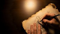Hand drawing treasure map on aged parchment paper with fountain pen under warm light creating adventure and mystery atmosphere for storytelling.