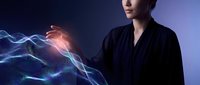 Woman in black blazer controlling glowing electric energy waves with hand gesture against dark blue background, representing power, technology, and innovation for business concepts.