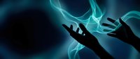 Silhouetted hands reaching toward each other with glowing turquoise energy flowing between them against dark background for spiritual and connection concepts.