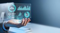 Business professional displaying holographic data analytics dashboard with charts and graphs for digital transformation and technology solutions.