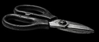 Vintage black metal scissors with textured handles isolated on transparent background, ready for clipart, t-shirt design, print-on-demand products, stickers, and sublimation projects.