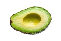 Fresh avocado half with pit removed on white background, healthy organic fruit for cooking and nutrition concepts, isolated for design use.