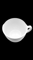 White ceramic tea cup isolated on transparent background, top angle view, cut out and ready for t-shirt design, clipart, stickers, print on demand, and sublimation projects.