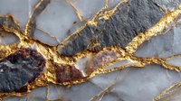 Luxurious marble texture with golden veins and cracks creating elegant abstract pattern for premium interior design and sophisticated backgrounds.