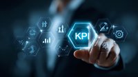 Businessman touching KPI button on virtual screen with performance metrics and business analytics icons for measuring company success.