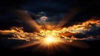 Dramatic sunset with sun rays piercing through dark storm clouds creating spectacular light beams and golden glow against moody evening sky.