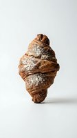 Freshly baked croissant with powdered sugar dusting, isolated on white background. Perfect for bakery, food, and culinary design projects.