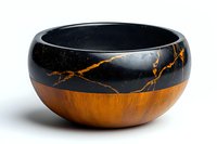 Modern wooden bowl with black marble effect and orange accent features dramatic lightning-like pattern on smooth surface against white background.