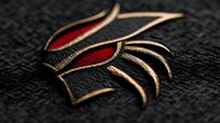 Elegant metallic gold and red emblem design with curved lines and sharp angles on textured black background, showcasing modern luxury branding style.