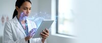 Female doctor using digital tablet with holographic medical data visualization in modern hospital office for healthcare technology innovation.