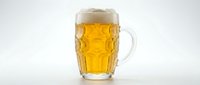 Glass mug filled with golden lager beer and foam head on white background, suitable for beverage, brewery, and pub advertising.
