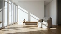 Minimalist interior with wooden furniture, large windows casting natural light across hardwood flooring, and neutral tones for modern home design projects.