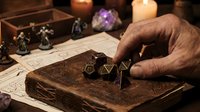 Elderly hands casting dice on ancient grimoire with candles and crystals creating mystical fortune telling atmosphere for divination practices.