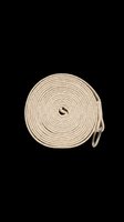 Coiled beige cotton yoga strap with metal ring, isolated on transparent background, ready for fitness, wellness, and print on demand design use.