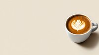Aromatic cappuccino with leaf latte art pattern in white ceramic cup on beige background. Minimalist coffee composition with copy space.