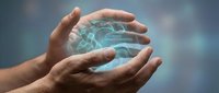 Young adult male hands cradling glowing digital globe with network connections, representing global technology, data protection, and worldwide business innovation.