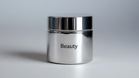 Luxury cosmetic jar with chrome cap and minimalist beauty label on clean white background for skincare product packaging and branding design.