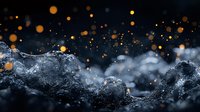 Dramatic water splash with golden bokeh lights against dark background creates atmospheric mood. Dynamic liquid motion frozen in time with sparkling highlights.