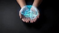 Human hands holding glowing holographic brain with neural networks on dark background for medical technology and artificial intelligence concepts.