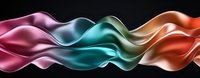 Smooth flowing silk fabric waves in vibrant colors of pink, turquoise, and orange create elegant abstract pattern on black background for luxury design projects.