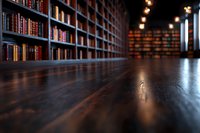 Dark wooden table surface in library with blurred bookshelves background and warm lighting creates moody atmospheric perspective for educational or literary concepts.