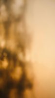 Soft bokeh background with warm golden and beige tones blending into neutral cream, creating an elegant, out-of-focus effect suitable for overlays, presentations, and design projects.