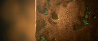 Martian planet surface with rocky terrain and atmospheric glow showing red desert landscape with scattered rocks and cosmic space environment.
