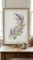 Watercolor botanical illustration of lupine flowers and ferns in wooden frame on rustic table, farmhouse home decor wall art for living room interior design.