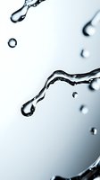 Macro photography of water drops and splashes in motion against light gray background, capturing liquid dynamics and surface tension in minimalist style.