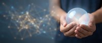 Hands holding glowing sphere with digital network particles emanating outward, representing innovation, technology, connectivity, and future business solutions.