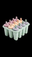 Silicone popsicle mold tray with colorful frozen ice pops isolated on transparent background, ready for kitchen, food blog, print on demand, stickers, and T-shirt design use.