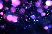 Magical purple and blue bokeh lights floating in dark space with glowing particles and dreamy blurred circles creating ethereal atmosphere.