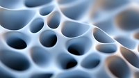 Macro view of abstract honeycomb pattern in soft blue and white tones showing circular holes and curved surfaces creating depth and dimension. Suitable for tech backgrounds.