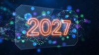 Glowing neon 2027 numbers in futuristic holographic display with colorful bokeh lights and particles on dark blue background for New Year celebration.