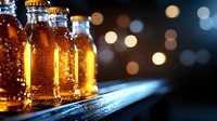 Cold glass bottles with condensation drops filled with amber liquid on dark background with bokeh lights creating cozy atmosphere for beverage advertisement.