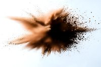 Brown powder explosion on white background, dynamic motion freeze captured mid-burst creating abstract art pattern, isolated design element for creative projects.
