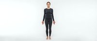 Woman in black athletic leggings and long-sleeve top standing against white background, wearing comfortable workout apparel for fitness, exercise, and sportswear design projects.